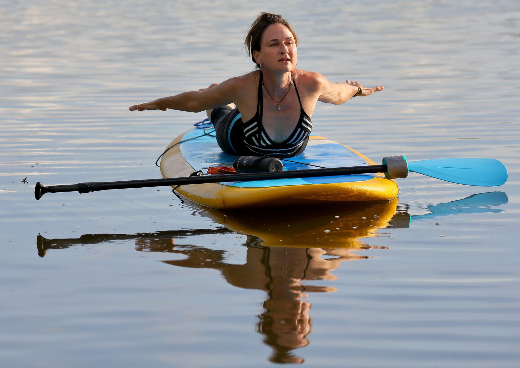 Paddleboard yoga at Creve Coeur Lake